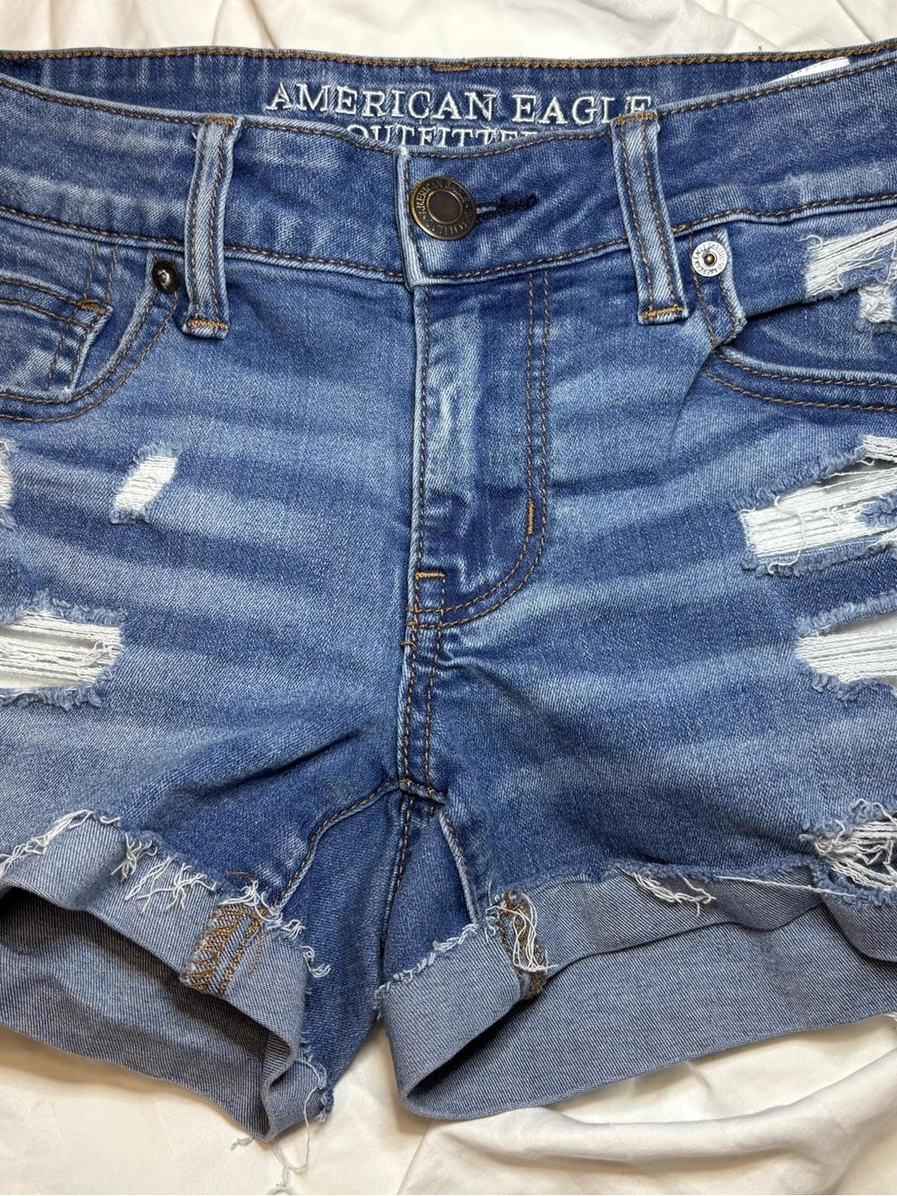 American Eagle Outfitters Super Low Shortie Distressed Denim Shorts